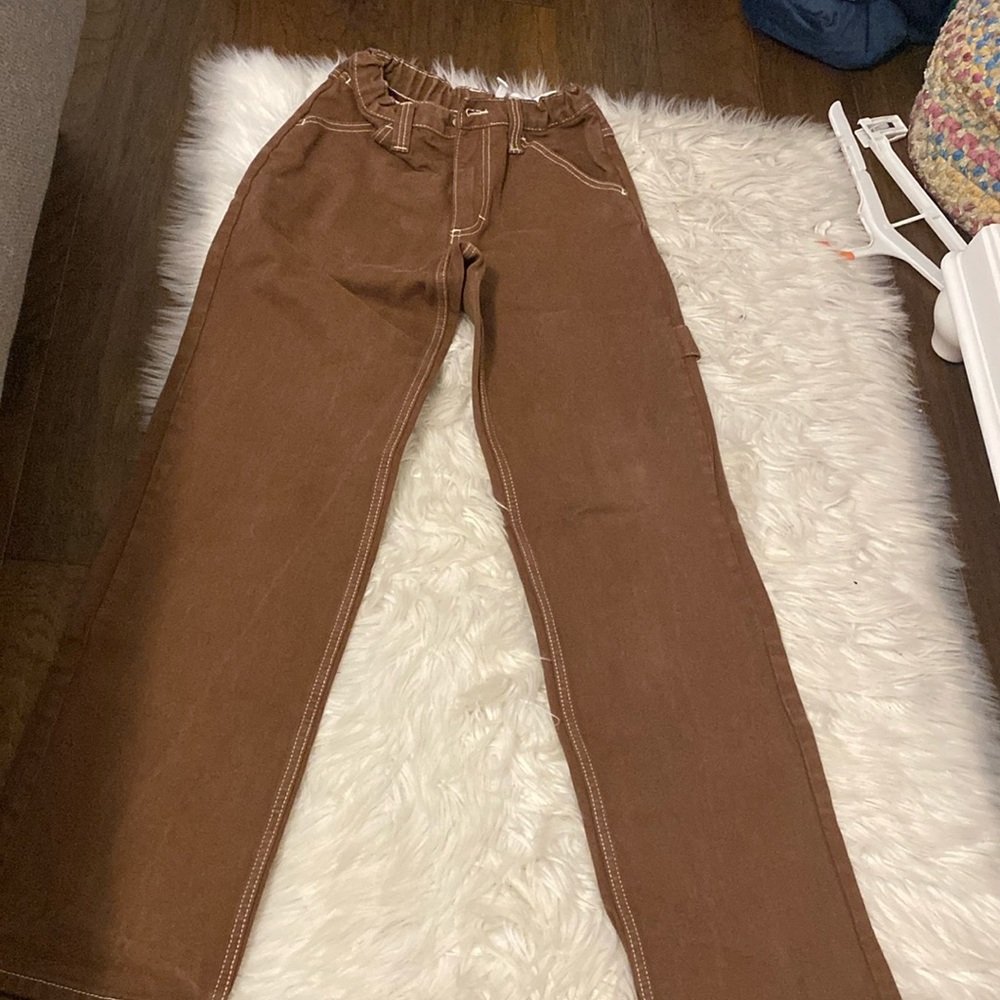 Brown slightly worn jeans